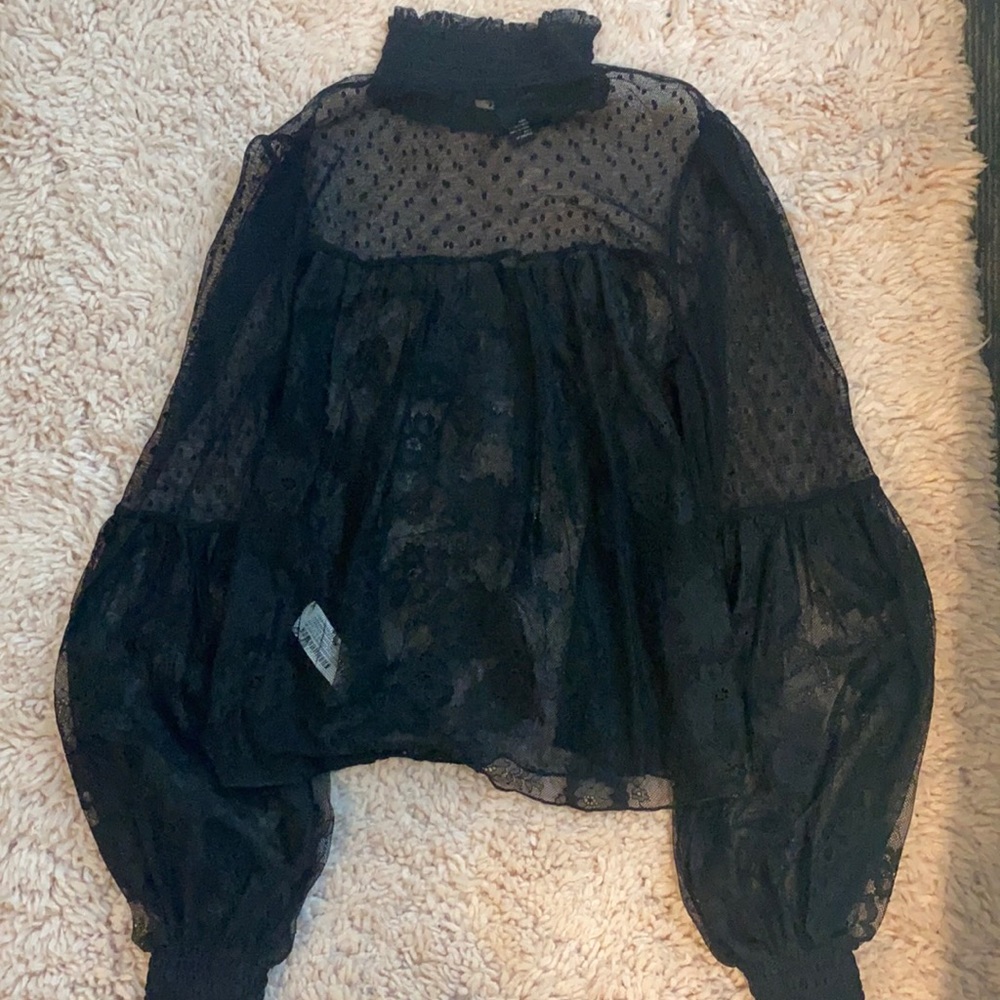Sheer black turtleneck blouse